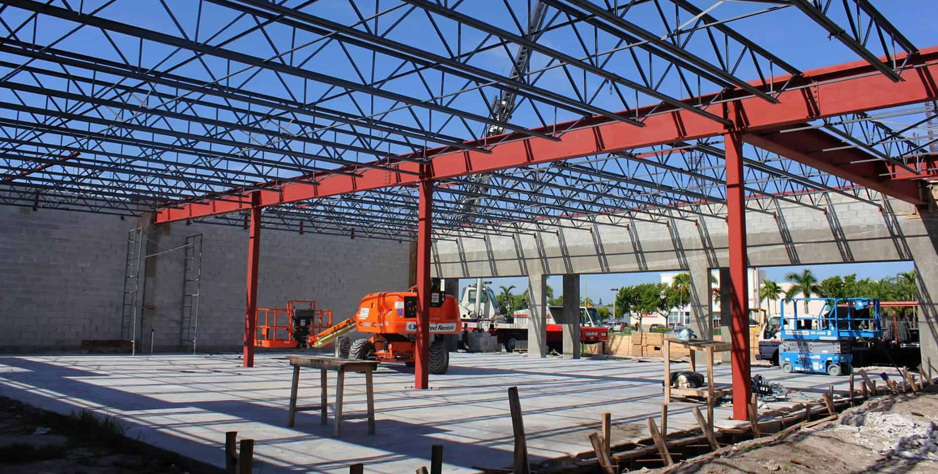 Commercial structure with red bins.